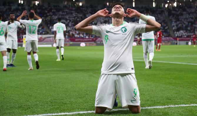  Saudi Arabia's Abdullah Alhamddan celebrates scoring the winner. (Reuters)