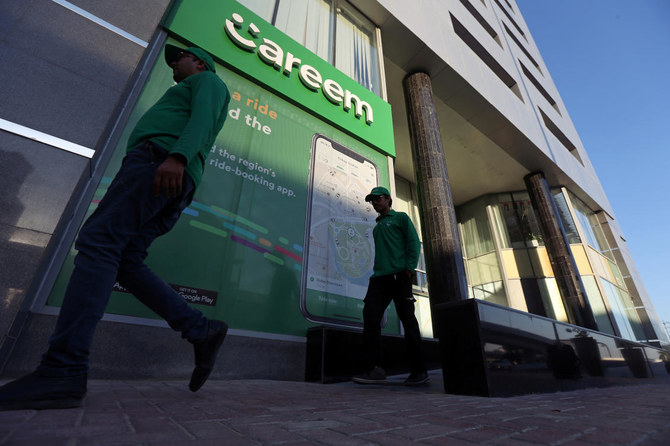 Careem employees walk past the company's headquarters in Dubai, UAE. Dec. 13, 2018. (Reuters)