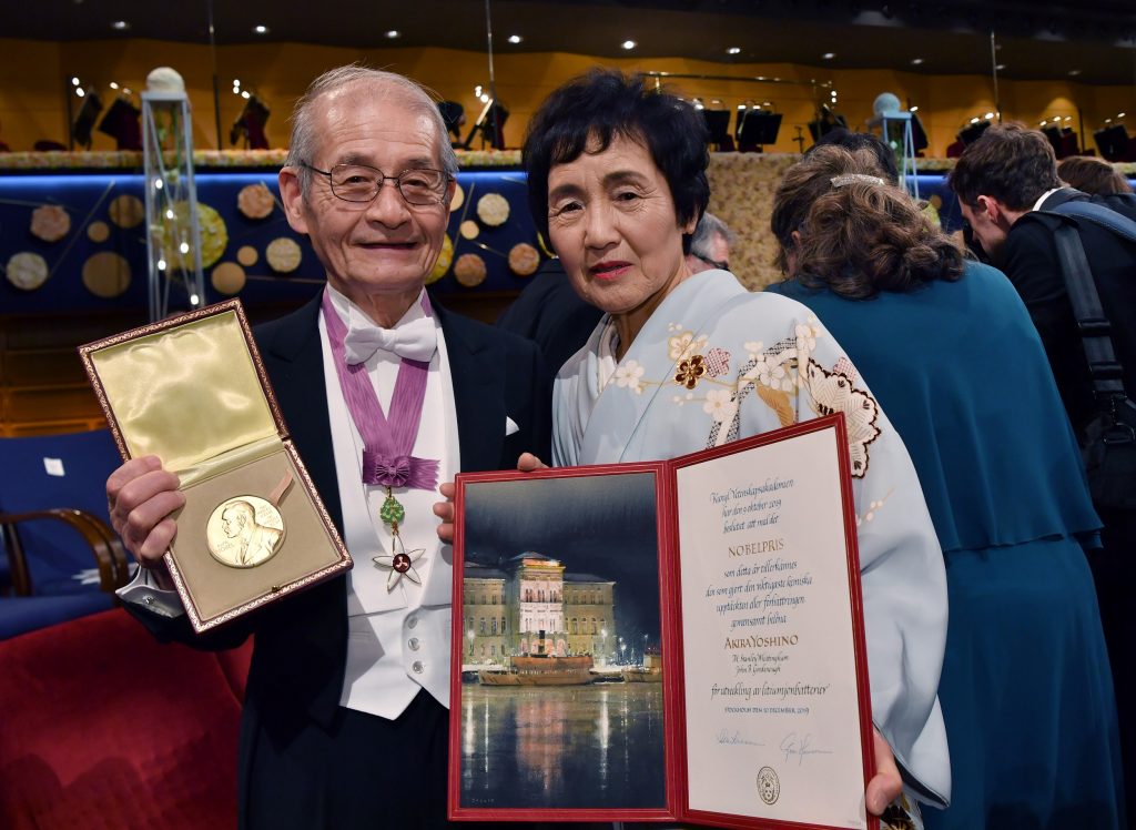 Japanese chemist and co-laureate of the 2019 Nobel Prize in Chemistry poses with his wife Kumiko during the Nobel Prize award ceremony on December 10, 2019 at the Concert Hall in Stockholm, Sweden. (AFP)
