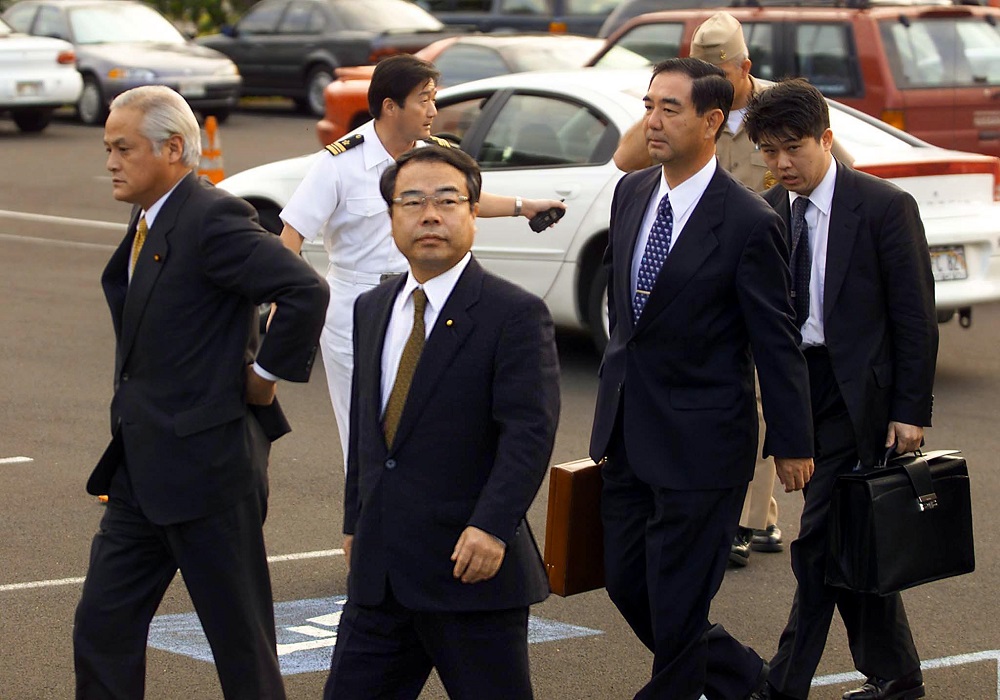 Yoshio Mochizuki (second left), a House of Representatives lawmaker of the ruling Liberal Democratic Party, died in his home prefecture of Shizuoka, central Japan, on Thursday. (AFP/file)