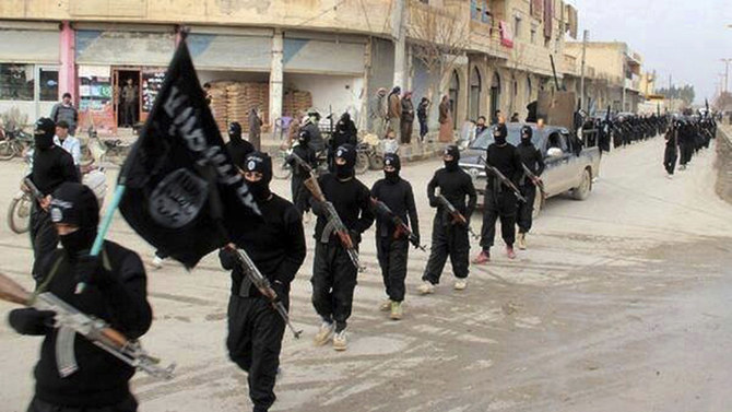 Daesh (Islamic State) fighters march in Raqqa, Syria, at the height of their power in 2014. (AP file photo)