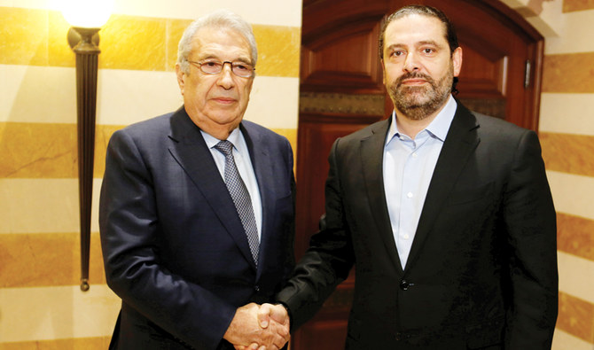 Samir Khatib, who withdrew his candidacy to lead a government, with Lebanon’s caretaker Prime Minister Saad Hariri in Beirut. (Reuters)