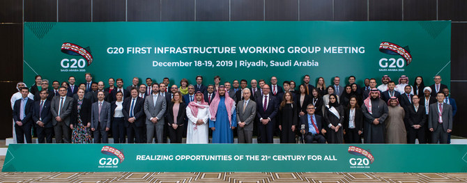 Family picture of the G20 Infrastructure Working Group (IWG) taken on Dec. 19 at the close of their two-day symposium. (Twitter photo)