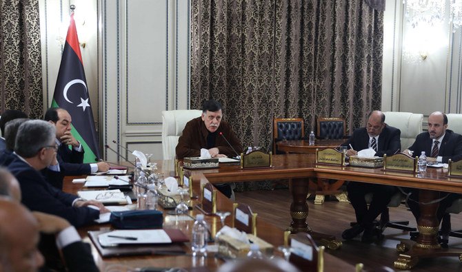 Libya's UN-recognized Prime Minister Fayez Al-Sarraj (C) holds a cabinet meeting in the Libyan capital Tripoli on Dec. 19, 2019. (AFP/Tripoli. (AFP)
