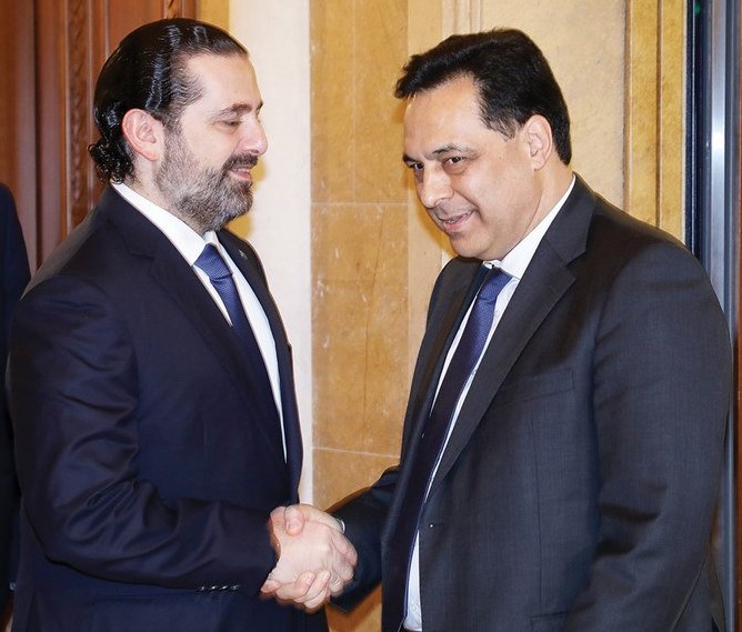 Outgoing Lebanese PM Saad Hariri meets with PM-designate Hassan Diab, in Beirut on Friday. (Photo/Supplied)