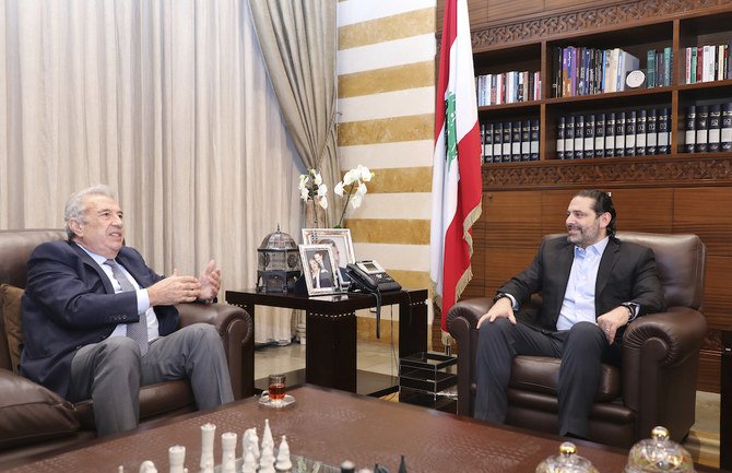 Former Lebanese Prime Mminister Saad Hariri meets with Samir Khatib, aLebanese businessman who was the front-runner to form a new government. (AFP)
