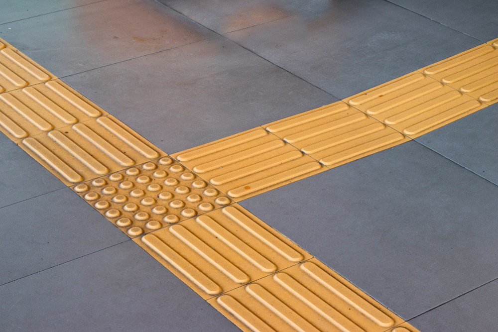 The tiles are generally installed with raised lines and/or dots that let visually impaired pedestrians know that they are able to walk on safely. (Shutterstock)
