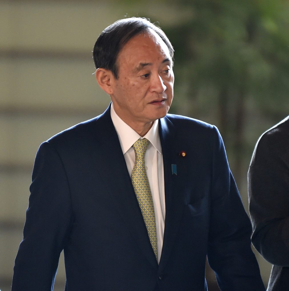 Japanese Chief Cabinet Secretary Yoshihide Suga inspected a port used by the US military in Naha. (AFP)