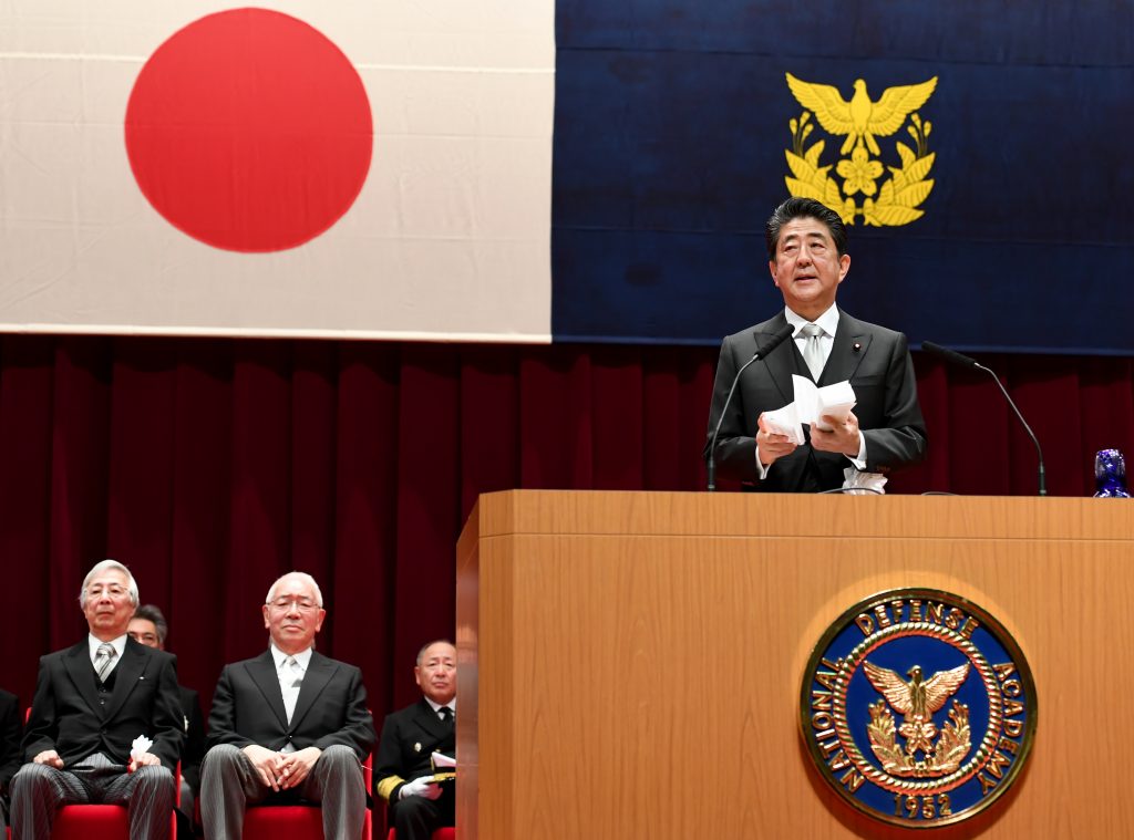 Japanese Prime Minister Shinzo Abe delivers his speech while attending the graduation ceremony of the Defense Academy in Yokosuka, Kanagawa prefecture on March. 17, 2019. (AFP)