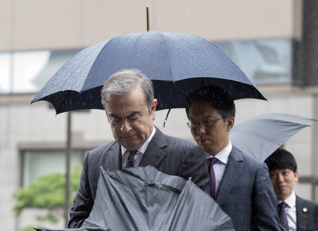 Former Nissan Motor Chairman Carlos Ghosn arriving for a pre-trial hearing at the Tokyo District Court in Tokyo on June 24, 2019. (AFP)
