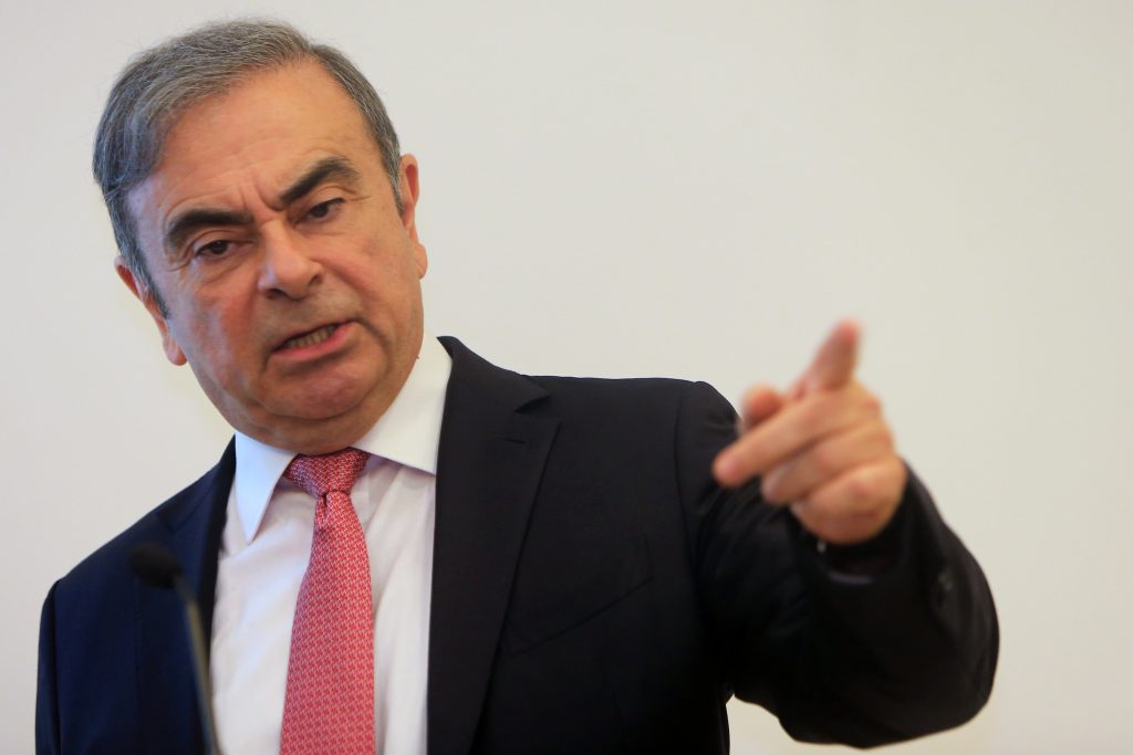 Former Renault-Nissan boss Carlos Ghosn addresses a large crowd of journalists on his reasons for dodging trial in Japan, where he is accused of financial misconduct, at the Lebanese Press Syndicate in Beirut on January 8, 2020. (AFP)
