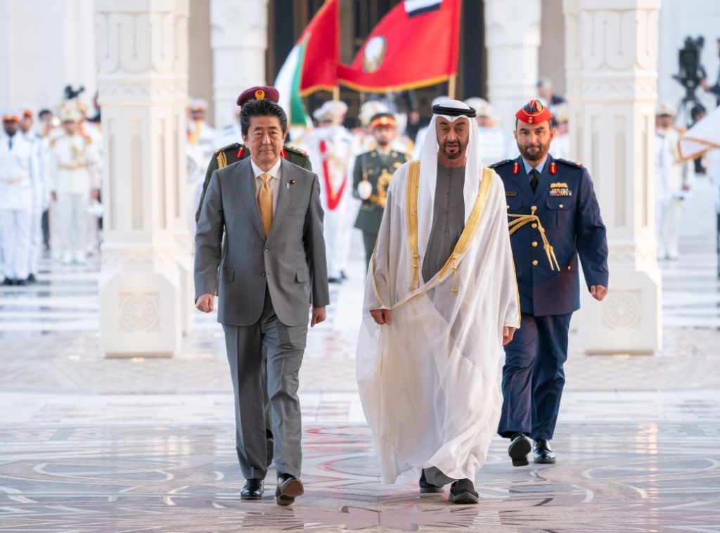 His Highness Sheikh Mohamed (R) and the Japanese Prime Minister Shinzo Abe (L) walk during a reception at Qasr Al Watan. (WAM)