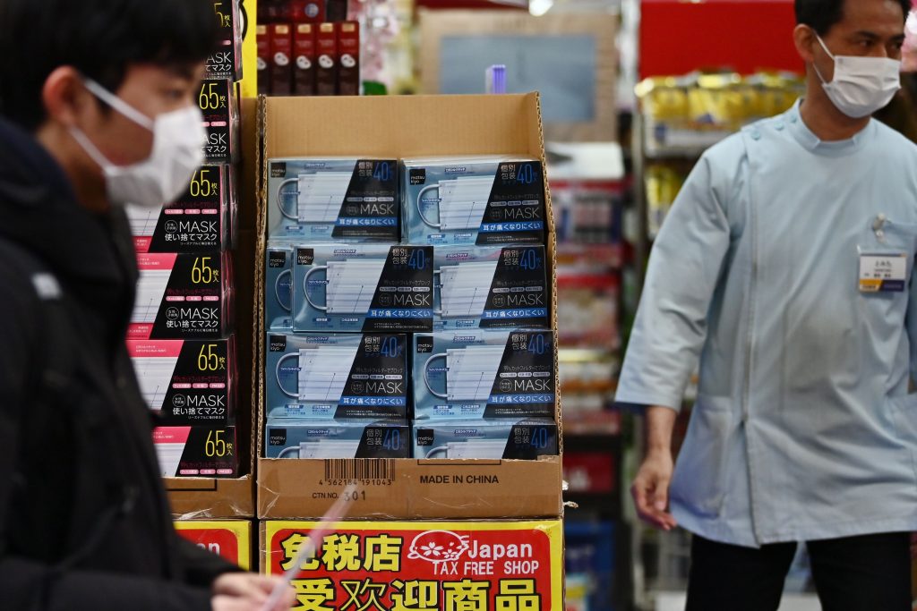 The designation under the infectious disease law will allow authorities to conduct compulsory hospitalization of infected patients and stop them from attending work. (AFP)