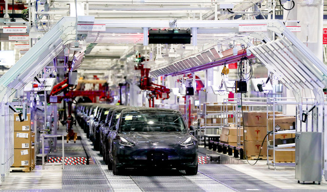 Tesla’s factory in Shanghai delivered its first cars to customers on Monday. (AP)