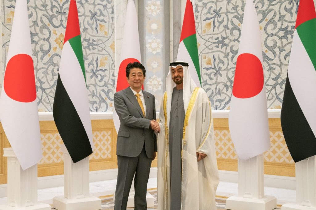 Sheikh Mohamedand the Japanese Prime Minister Shinzo Abe shake hands at a reception in Qasr Al Watan, UAE. (WAM)