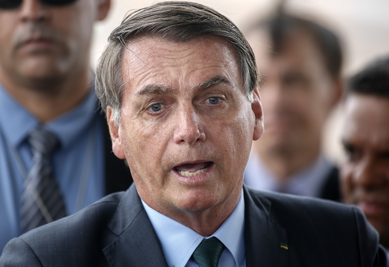 In an interview with GloboNews, Ghosn said President Jair Bolsonaro (in picture) had previously contacted his sister, Claudine Bichara, who lives in Brazil, raising his expectations for official intervention in his case. (AFP/file)