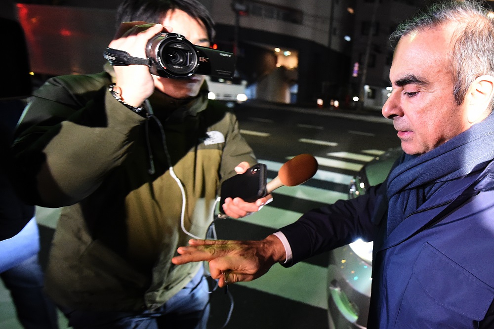 The private jet operator, who assisted unwittingly in the escape of ex-Nissan boss Carlos Ghosn (above) from Japan, has said that Ghosn used two of its planes illegally. (AFP/file)