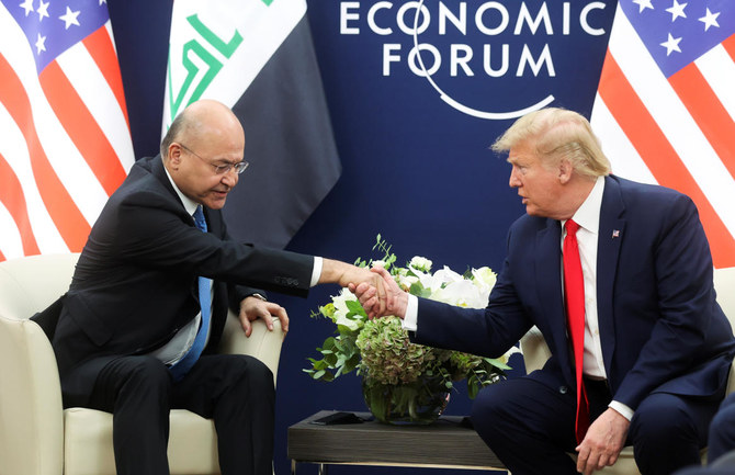 Donald Trump meeting Iraqi President Barham Salih during the World Economic Forum in Davos. (Reuters)