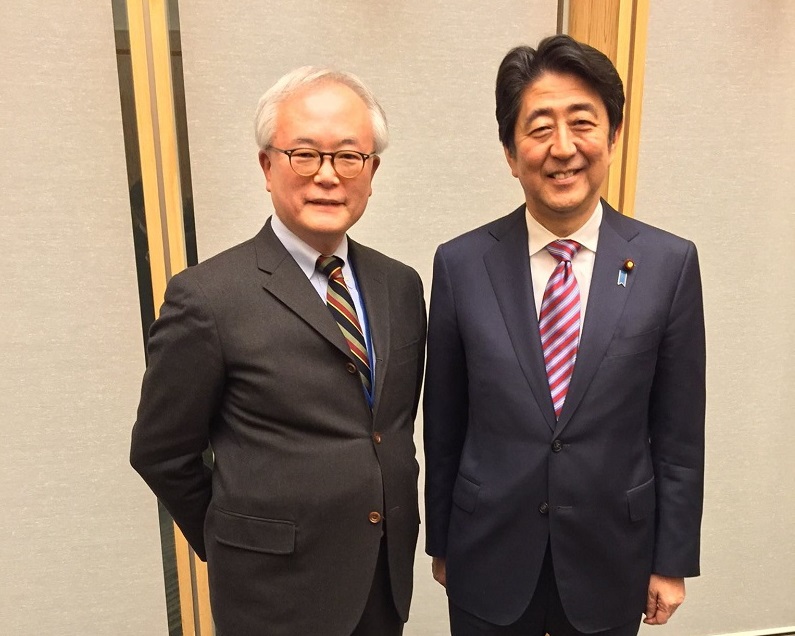 Tomohiko Taniguchi (left), a special advisor to Prime Minister Shinzo Abe, in Saudi Arabia. (Supplied)  