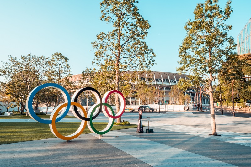 The Olympic symbol logo at Japan’s new National Stadium in Shinjuku. Dozens of homeless people who sleep in basements of Tokyo's Shinjuku train station worry that with Japan's image at stake authorities will force them to move ahead of the Olympics. (Shutterstock)