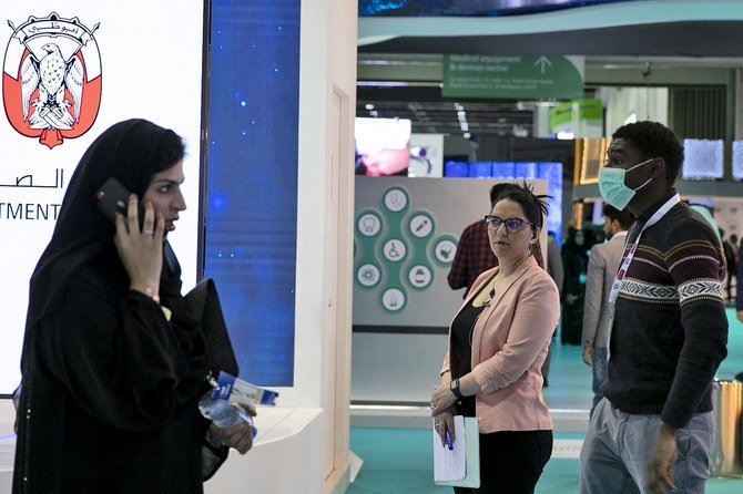 A man wears a mask as he visits the UAE Ministry stand during the Arab Health Exhibition in Dubai on Wednesday, Jan. 29, 2020. (AP)