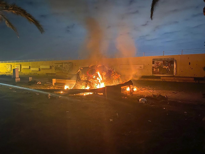 A burning vehicle at the Baghdad International Airport following an airstrike in Baghdad, Iraq, early Friday, Jan. 3, 2020. (AP)