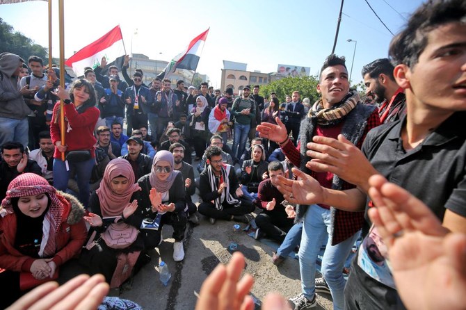 Iraqi anti-government demonstrators rally near the Ministry of Higher Education in the capital Baghdad on January 14, 2020. (AFP)