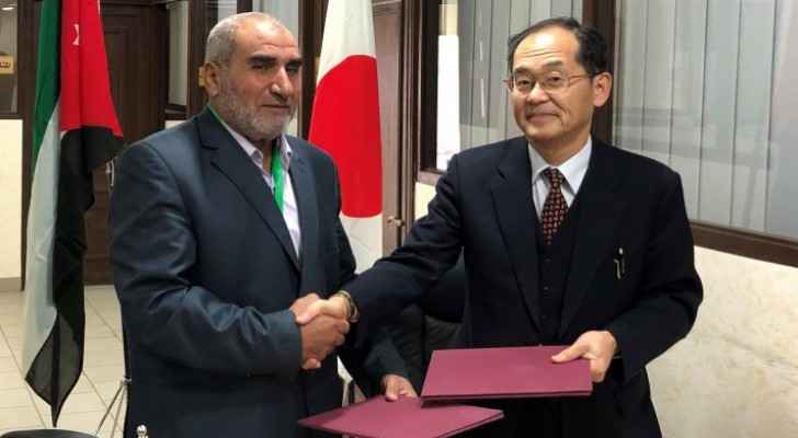 Japanese Ambassador to Jordan Yanagi Hidenao and President of the association Mousa Salman Al Aqtash signed a grant contract on Monday. (Jordan Times/Japanese Embassy)