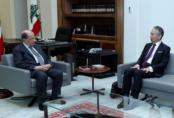 Lebanese president Michel Aoun with Japan's Ambassador to Lebanon Takeshi Okubo in the presidential palace, in Baabda on Tuesday. (AP)