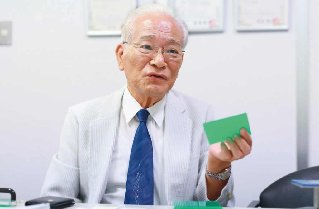 Chairman and Founder of Proseven Co., Ltd., Seizo Kodama holding a gel-pad. (GOJ)
