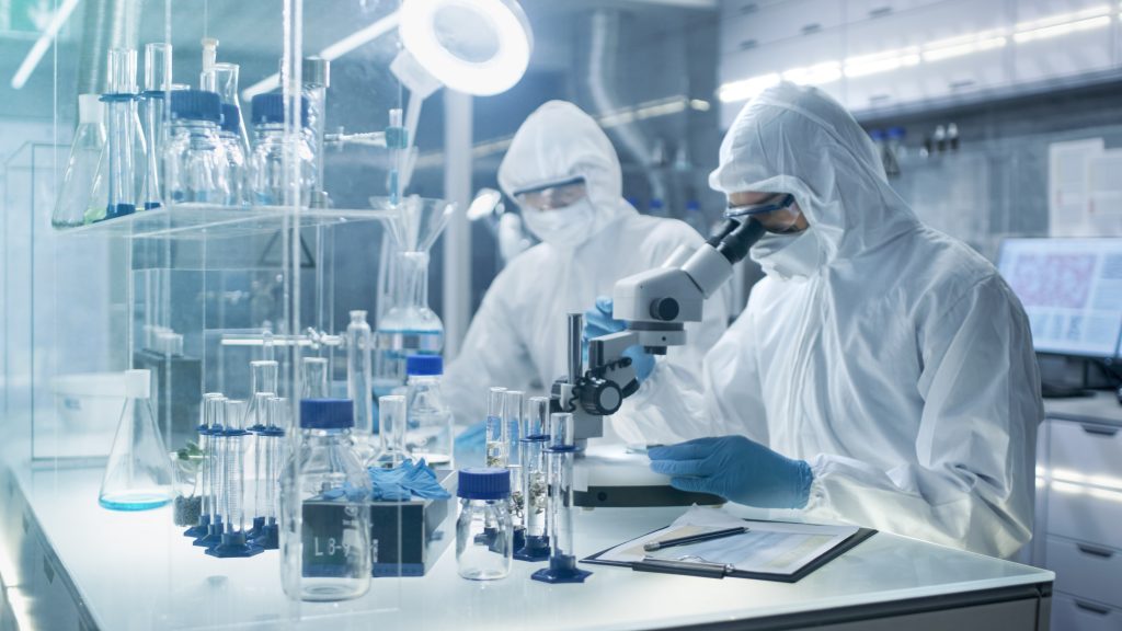Scientists conduct research in a secure high level laboratory. (Shutterstock)