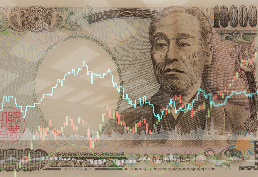 Japanese money currency exchange indices and forex trading stock market graph. (Shutterstock)