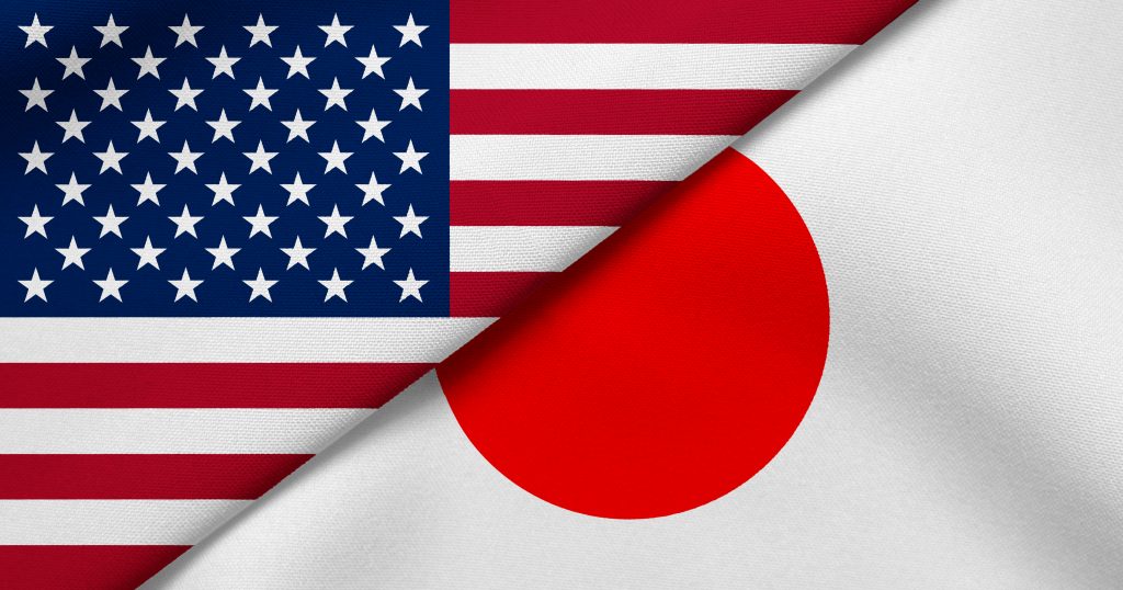 Flags of the US (L) and Japan (L). (Shutterstock)