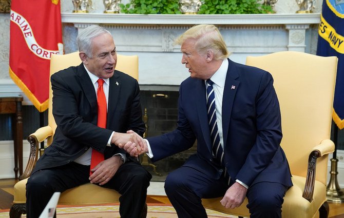 President Donald Trump shakes hands with Israeli Prime Minister Benjamin Netanyahu in the Oval Office of the White House, Monday. (AP)