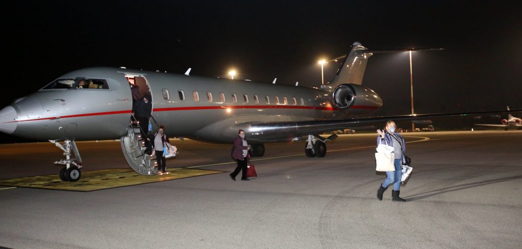 A handout picture provided by the Magen David Adom (MDA) shows Israeli passengers leaving an aircraft upon their return to Israel after being quarantined on board the coronavirus-stricken Diamond Princess cruise ship in Japan, early in the morning of February 21, 2020. (AFP)