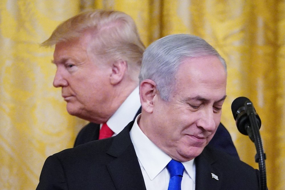 President Donald Trump with Israeli Prime Minister Benjamin Netanyahu as he announced his peace plan in the White House. (File/AFP)