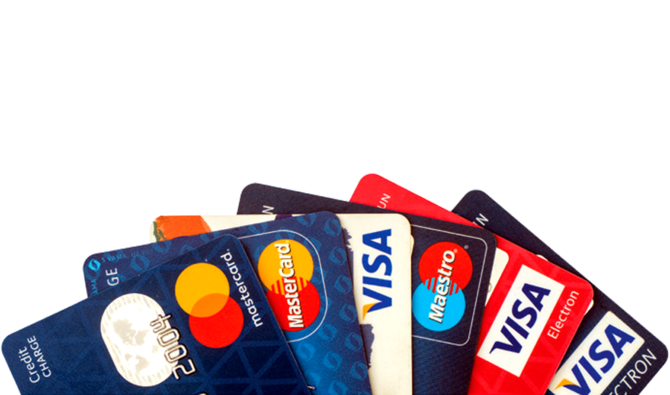 Closeup pile of credit cards, Visa and MasterCard, (Shutterstock)