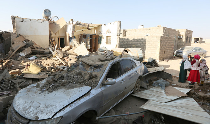 Girls stand at the site of a Houthi ballistic missile attack over the populated district of Rawda in Marib, Yemen February 6, 2020. (REUTERS)