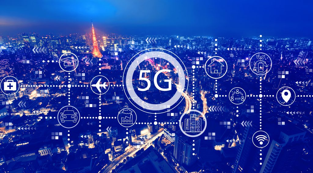 5G network logo with aerial view of Tokyo, Japan.  (Shutterstock)