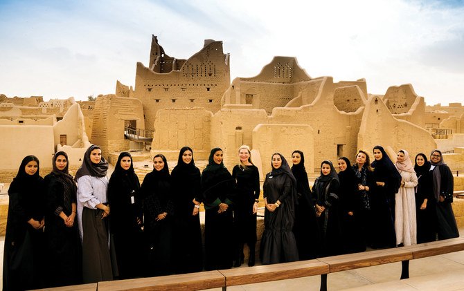 Behind the scenes: The ladies taking a commemorative photo in Diriyah. Diriyah Gate Development Authority’s employees feel a sense of pride, nurturing their county and showcasing its history. (AN photo)