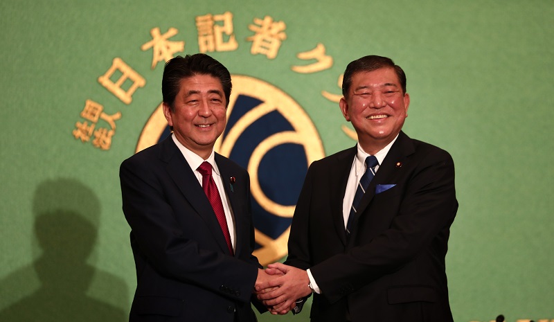 Shigeru Ishiba (right), former secretary-general of Japan's ruling Liberal Democratic Party, was chosen by the largest proportion of the public as the most suitable person to be prime minister after the current term of Shinzo Abe. (AFP/file)
