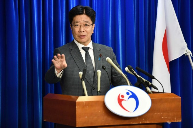 Japan’s Health Minister Katsunobu Kato speaks during a press briefing at the ministry in Tokyo on February 20, 2020. (AFP)