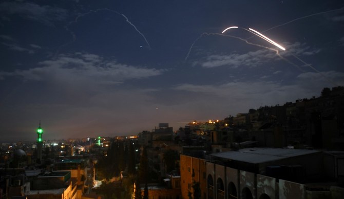 Syrian air defense batteries responding to what the Syrian state media said were Israeli missiles targeting Damascus. (File/AFP)