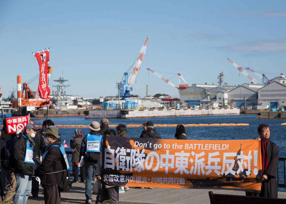 Marxist Zengakuren group in front of Yokosuka Bay with banners saying 