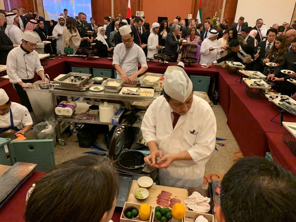 Chef Yukitaka Kitade preparing fresh sushi for guests 