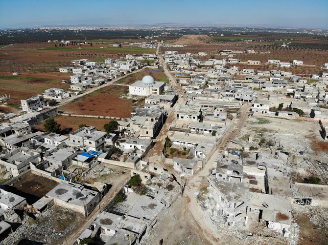 The village of Qaminas, about 6 kilometers southeast of Idlib city in north-western Syria on Feb. 9, following weeks of battles in the rebel-held Idlib region. (AFP)
