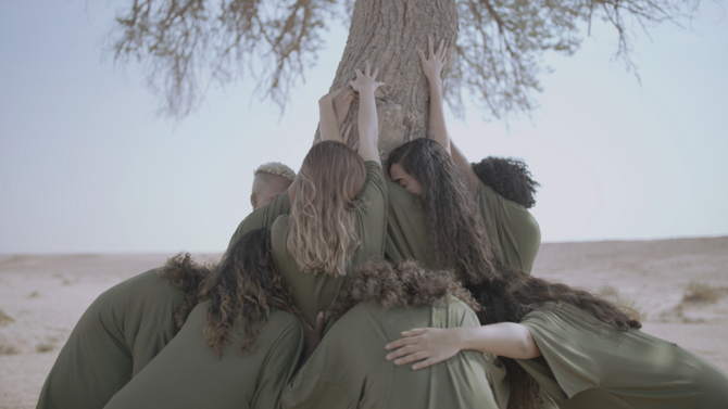 In Marwah Al-Mugait’s video, a powerful group of performers move and chant, recalling the reactive, unconscious defense mechanisms of organisms in danger. (Supplied)