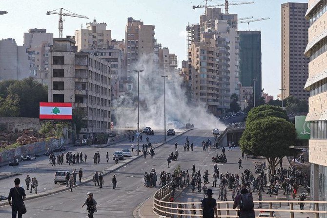 Tear gas wafted through central Beirut where security forces blocked roads leading to the parliament building in the already heavily barricaded downtown area. (File/AFP)