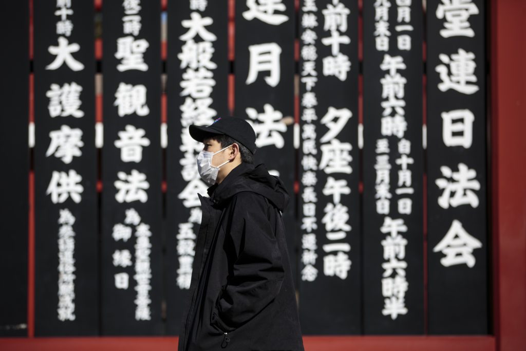 A man wears a face mask as he visits Sensoji temple in Tokyo on Feb. 3, 2020. (AFP)
