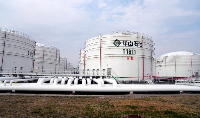Oil tanks are seen at an oil warehouse at Yangshan port in Shanghai, China. (Reuters/File)